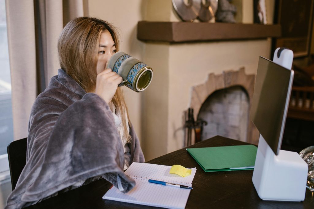 Girl drinking a cup of coffee